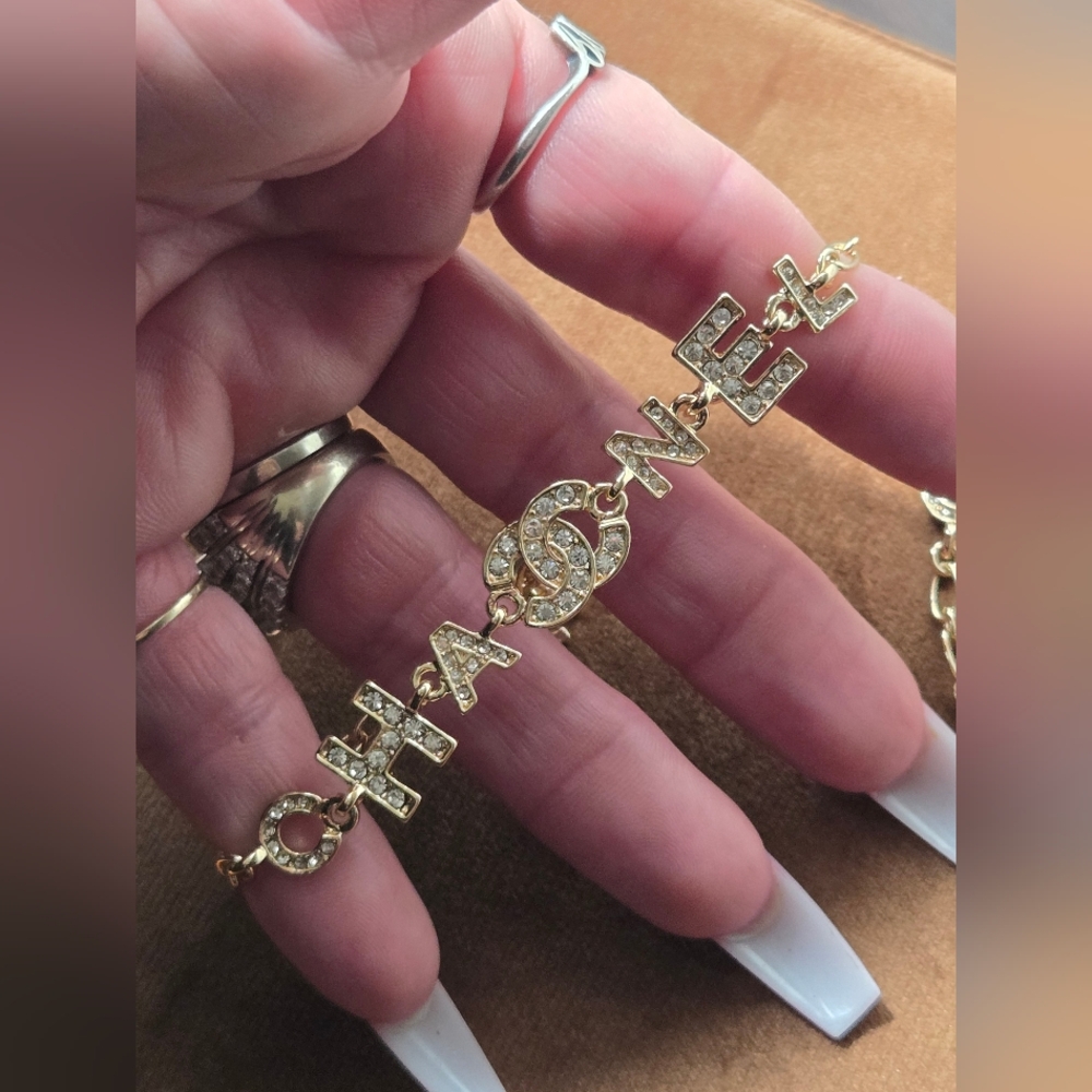 Gold Tone Logo Bracelet With Rocks - Picture 13 of 14